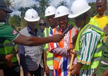 Hon. James K. Momo, Assistant Minister for Administration and Insurance breaks ground in Lofa County