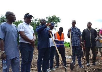 Hon. Archibald S. Abban, Deputy Minister for Administration and Insurance breaks ground in Nimba County.