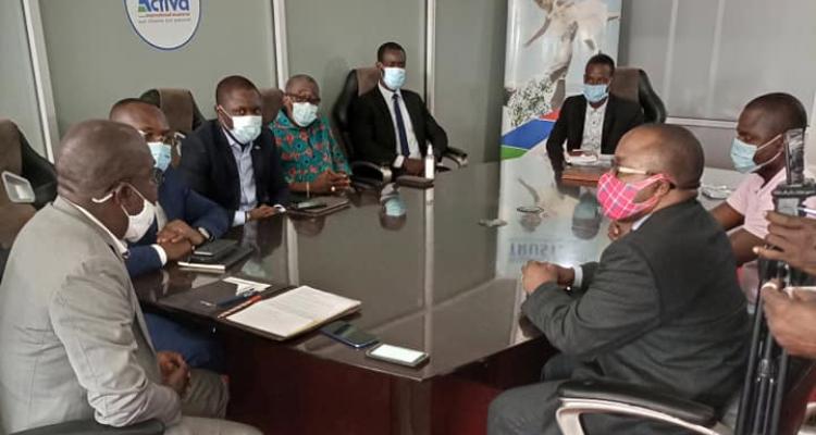 Deputy Transport Minister for Administration & Insurance, Honorable Sirleaf R. Tyler (right) and Leadership of the Liberia Insurance Association.